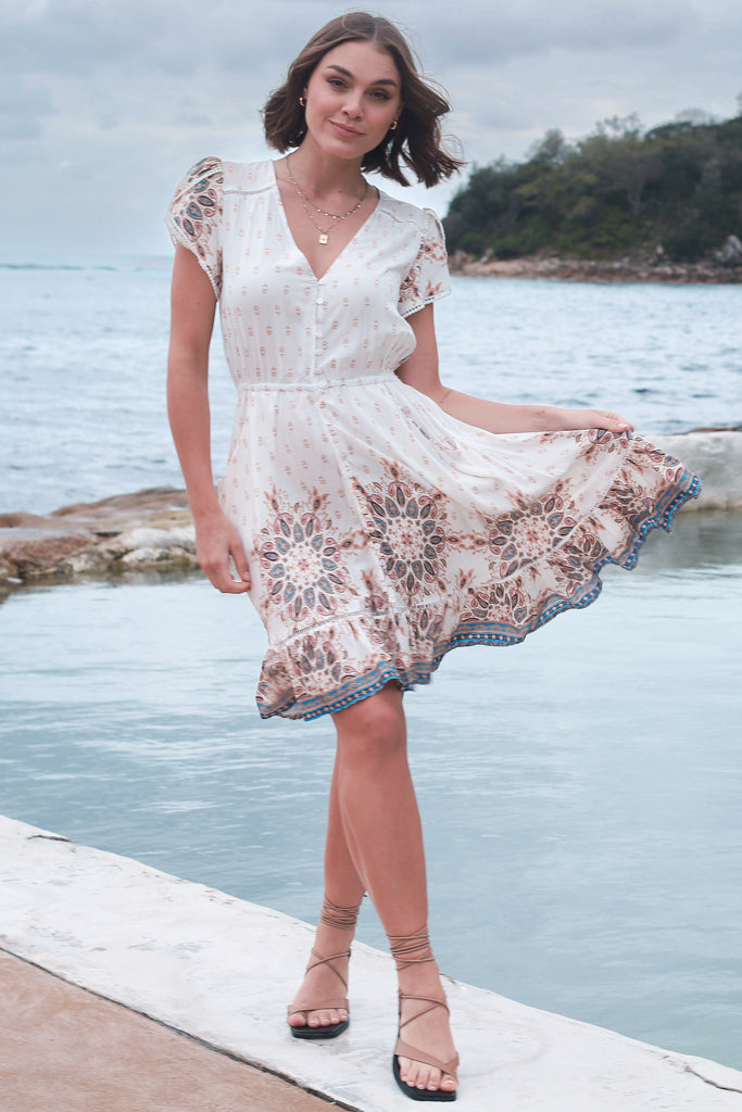 Jaase - Lizzie Mini Dress: Butterfly Cap Sleeve Button Down Dress With Pockets In Gemstone Print